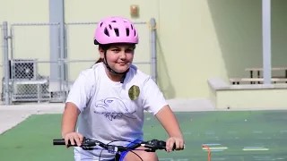  Student Riding a Bike